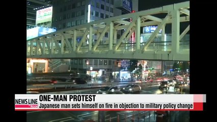 Japanese man sets himself on fire in protest of military policy change