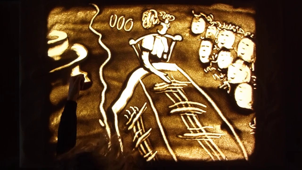 Salon du livre soirée capitale spectacles littéraires talent incroyable de dessin de sable