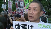 Japan pushes on with military reform despite public anger