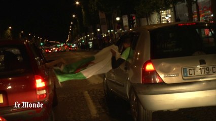 Télécharger la video: En voiture avec les supporteurs de l’Algérie sur les Champs-Elysées