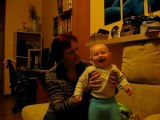 laughing 7 months with grandmother