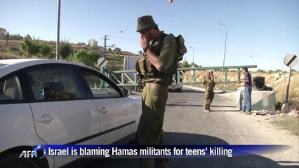 Israel tightens security in Hebron after teens' killing