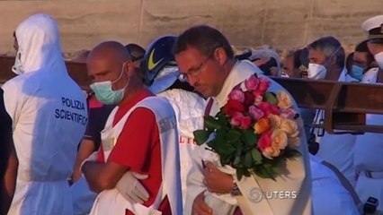 Migrants' bodies arrive in Sicily