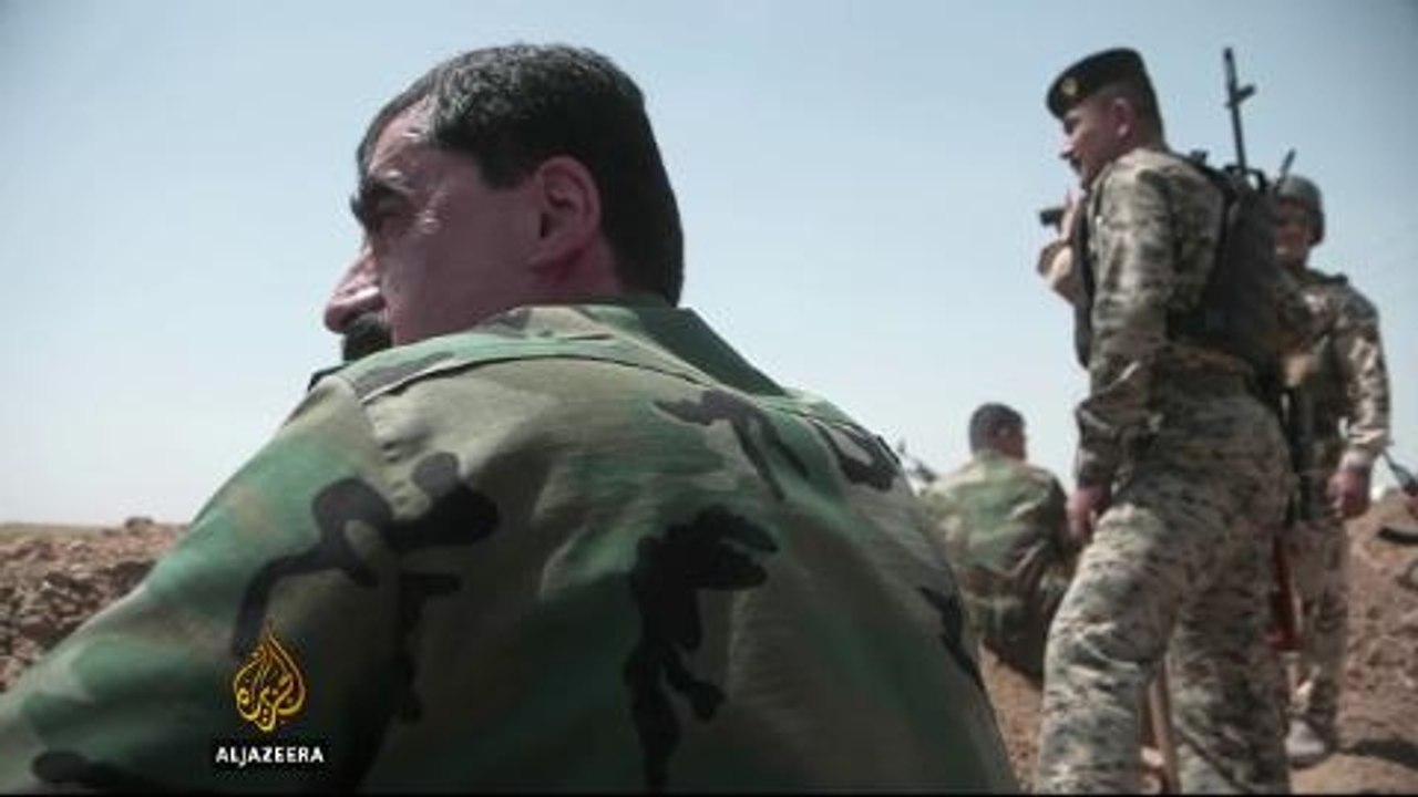Kurdish fighters key in fight against rebels