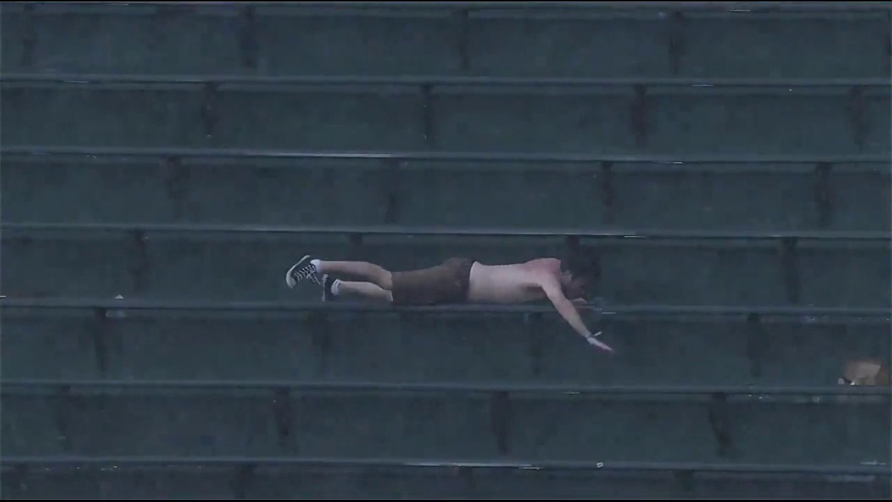 Crazy Fan swimming at Wrigley Field! Hilarious...
