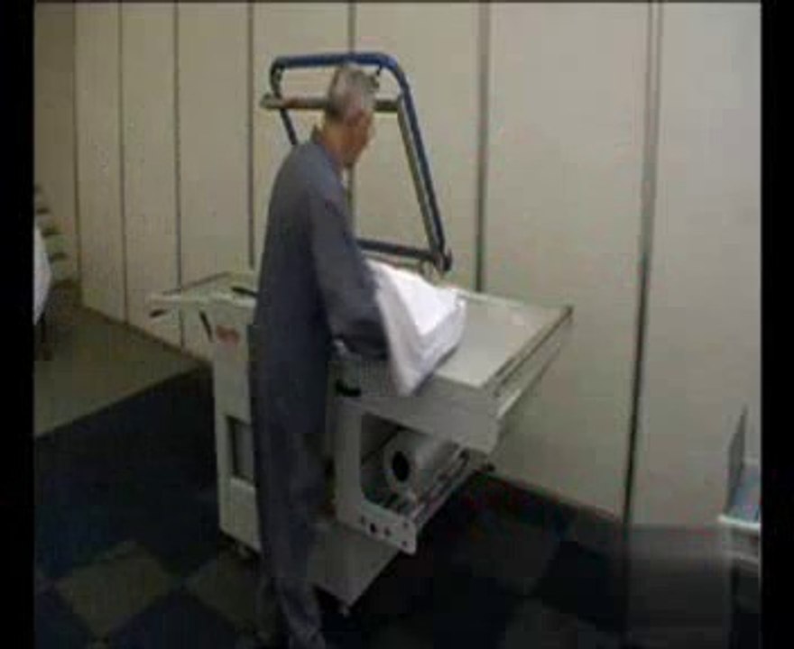 Machine de mise sous film