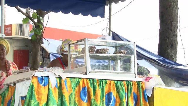 Brasil 2014 - Vendedores ambulantes de comida ganan su pulso a la FIFA