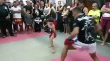 great fight by little boy with young man.