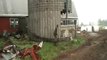 Man knocks down silo with sledge hammer