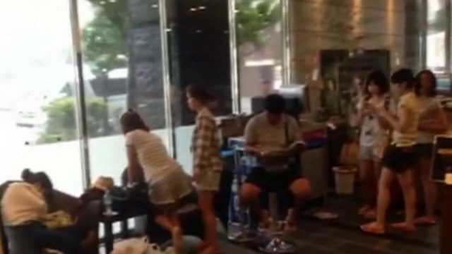 Typhoon churns towards Japan, thousands evacuated