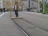 Amazing skatebaorder on tramway rails... with a DIY Skateboard!