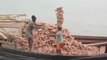 Indian Man Carrying Bricks on the head - Must Watch