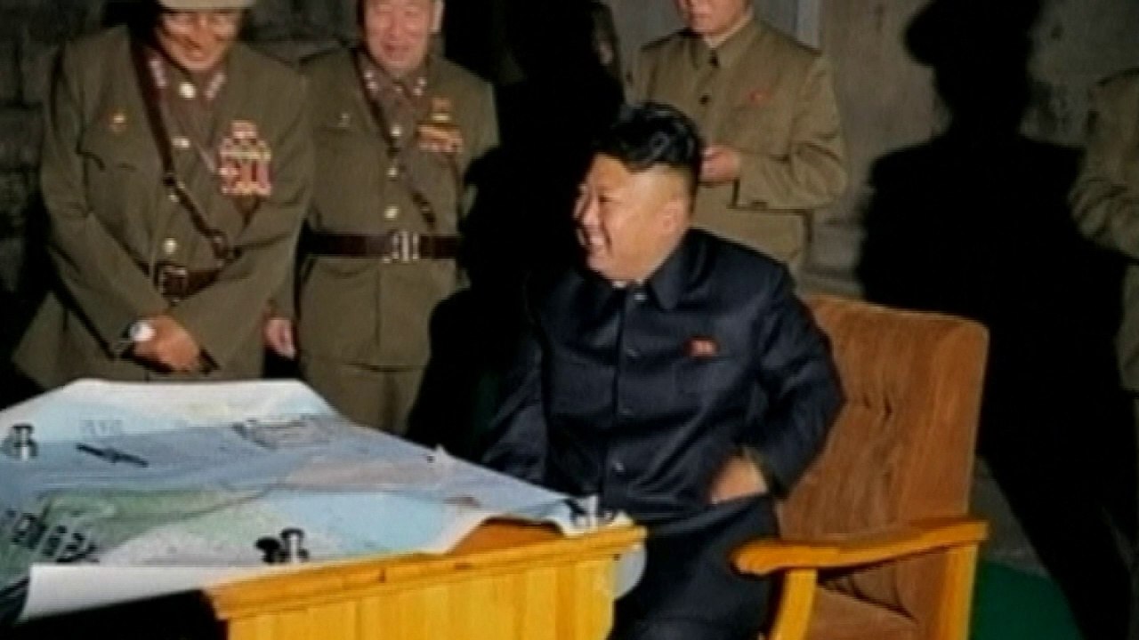 North Korea: Kim Jong-un pictured watching rocket launch