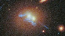 Hubblecast 76: Merging galaxies and droplets of starbirth