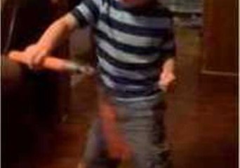 Child Ninja Shows His Nunchuck Skills