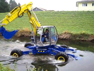 Kaiser Excavator jump into a channel