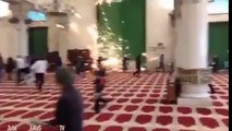 Israeli police attacking worshipers in Masjid Al-Aqsa.