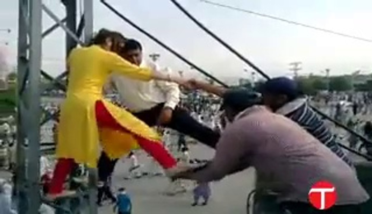 Female Anchor (Ghareeda Farooqi) Climbing on Poll