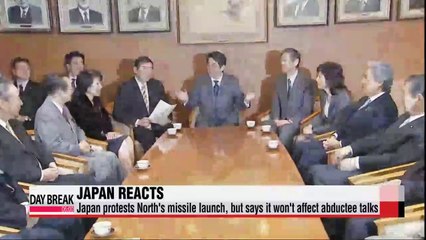 Japan protests North's missile launch, but says abductee talks will go on