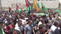 Hebron buries young Palestinian killed by Israeli forces