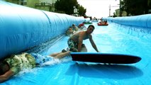 Crazy guys doing Urban Surfing down streets of San Francisco!