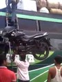 Indian hulk lifts bike on his head
