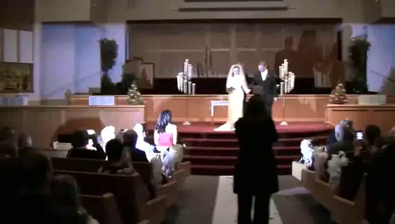 At My Wedding Twitterring and Facebooking at the Altar