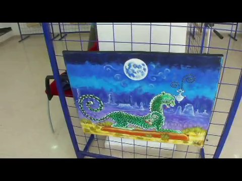 Canal Algérie en train de filmer le reportage de l'exposition Des masques sur les couleurs