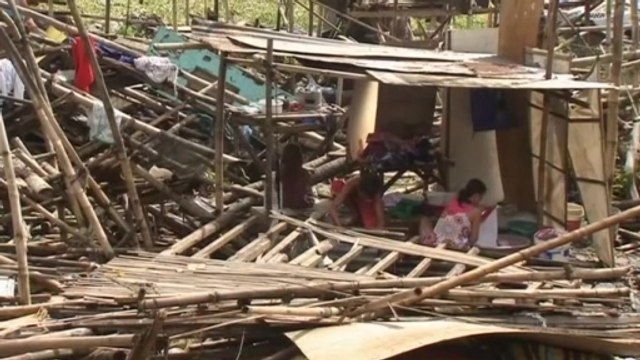 Filipino residents assess damage of Typhoon Rammasun