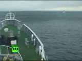 Tsunami Climbing Incredible video of ship heading into wave in Japan