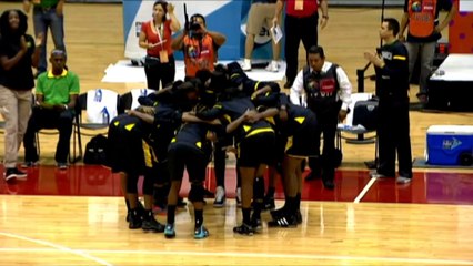 Jamaican women dance ahead of their match