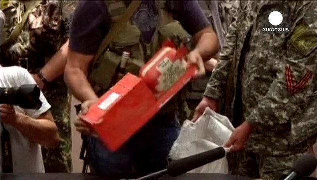 MH17: Bodies arrive in Kharkiv before moving to their final resting place