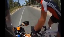 Lucky Cyclist, almost smashed and killed by motorcycle driver!