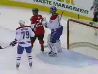 Carey Price Pushes Chris Neil's Helmet Over His Eyes