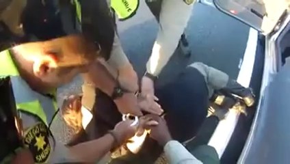 Cop Drags Woman Out Of Her Car Because She Touched Him