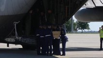 Plane with first coffins of Malaysian airliner victims leaves Ukraine