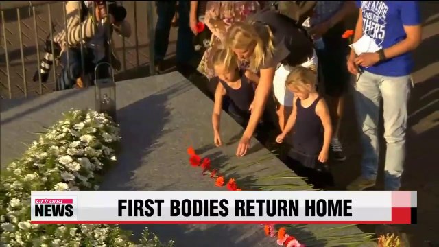 First bodies of MH17 victims arrive in Netherlands