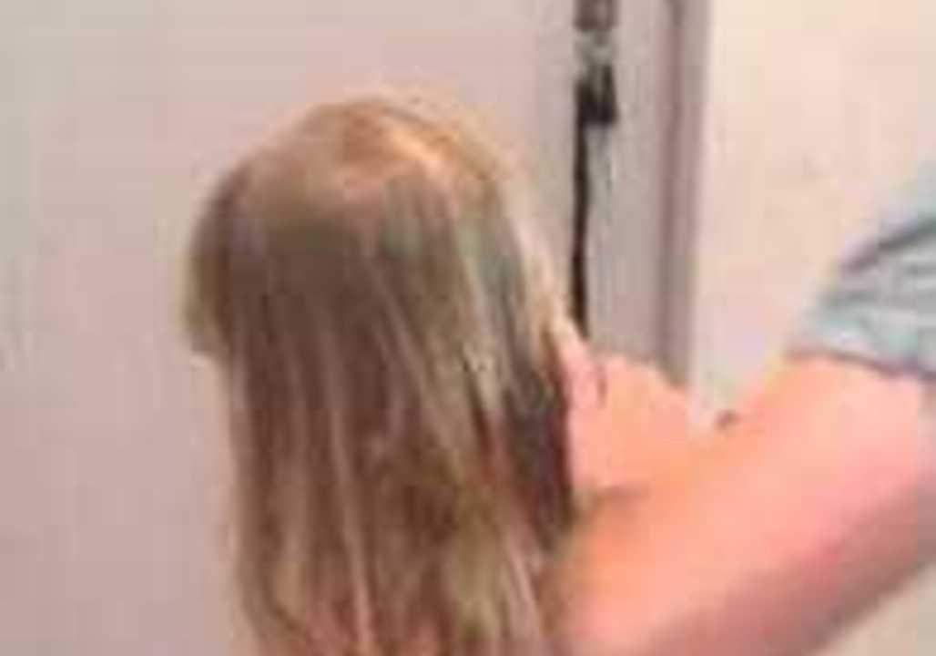 Dad Uses Vacuum Cleaner to Make Daughter's Ponytail