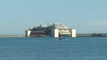 Costa Concordia ends final voyage to scrap yard