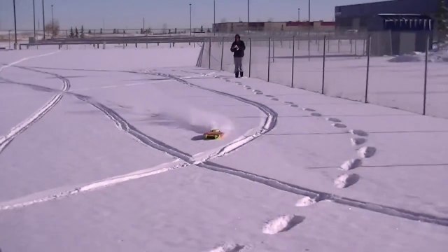 Snow Boating : Remote controlled boat on frozen lake covered with snow!