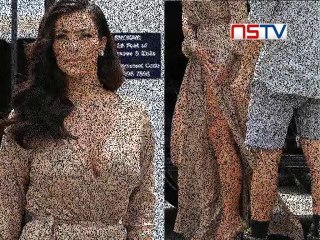 Kim suffers wardrobe malfunction