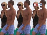 Spotted Paris Hilton kissing on beach