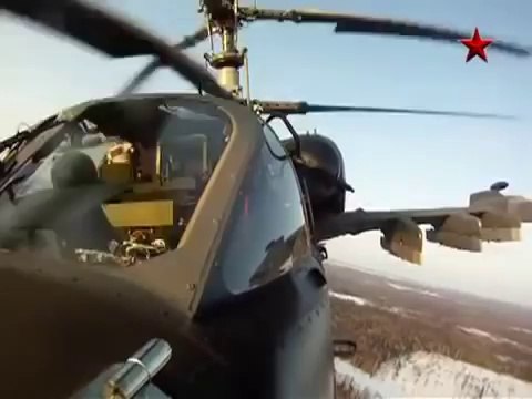 Russian Military Helicopters Mi 35 and 52 out on patrol ``