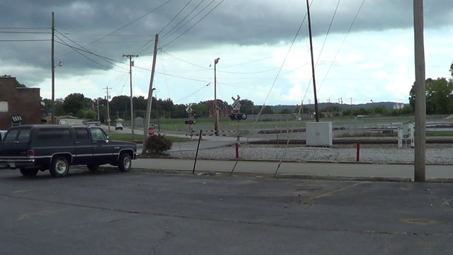CSX power leads NS 169 Mixed Freight SB through Lenoir City Tn.