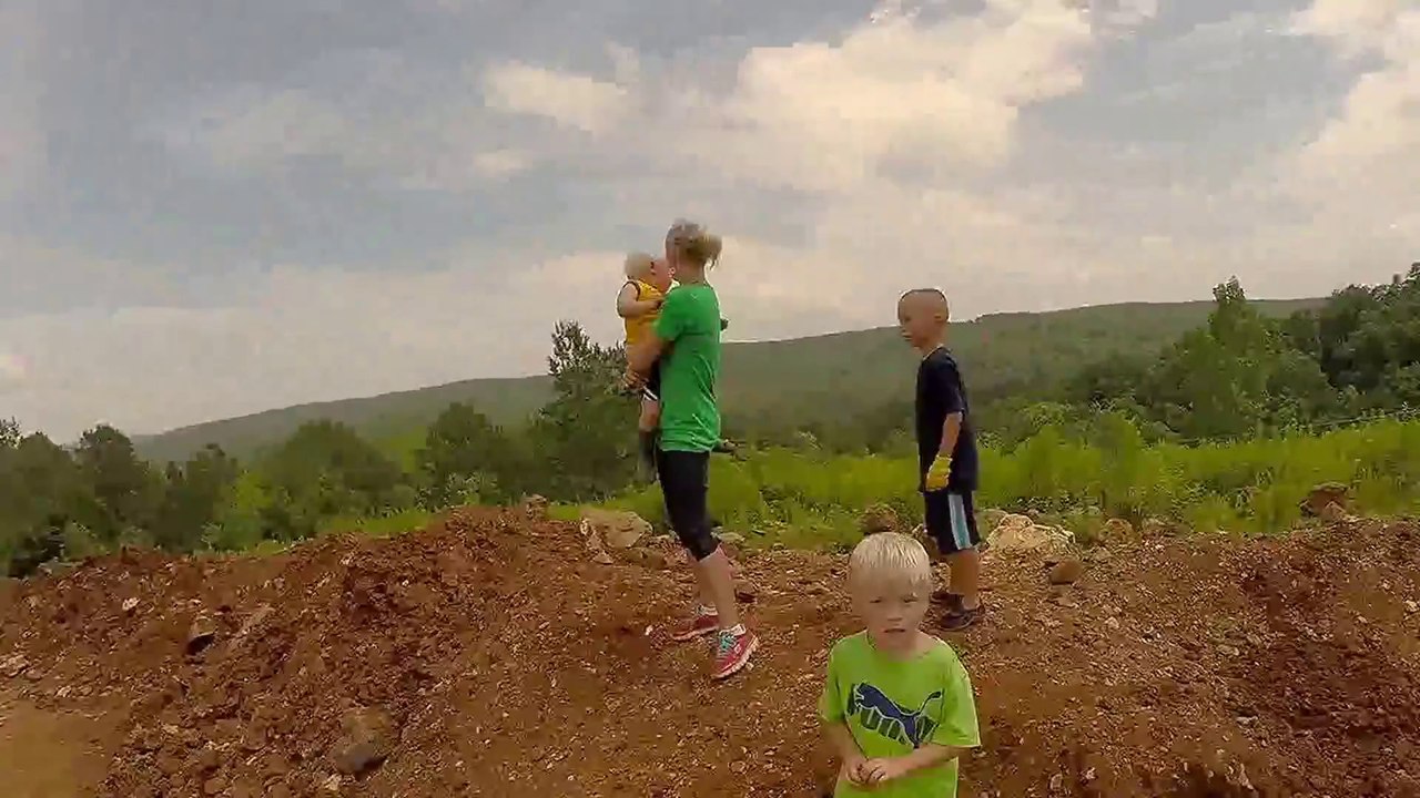 Fighter jet fly by over a mountain