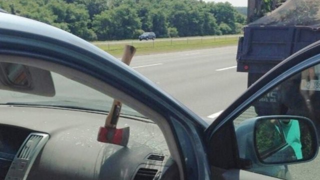 Random Flying Hatchet Smashes Car's Windshield on Highway
