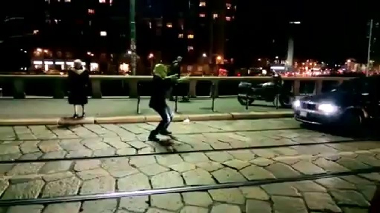 Alien lends a helping hand to older pedestrian