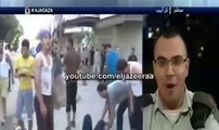 صحفي مغربي يبهدل افيخاى ادرعى و يمسح به الأرض مباشرة على قناة الجزيرة