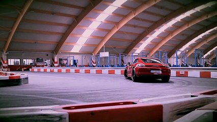 Porsche Cayman GTS wrecks a go-kart track