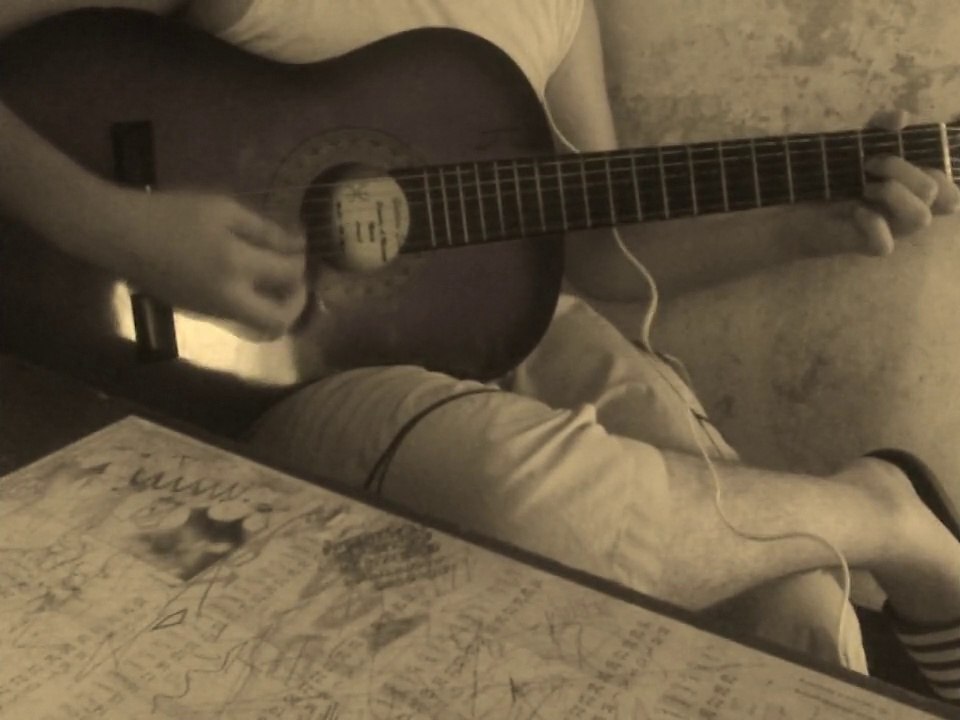 un petit air  musique à la guitare